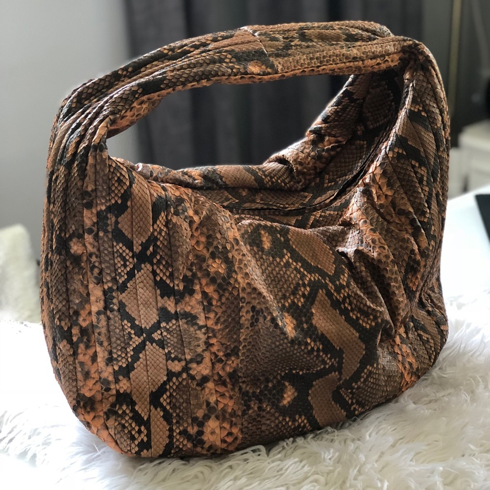 Genuine Python Skin pumpkin handbag.